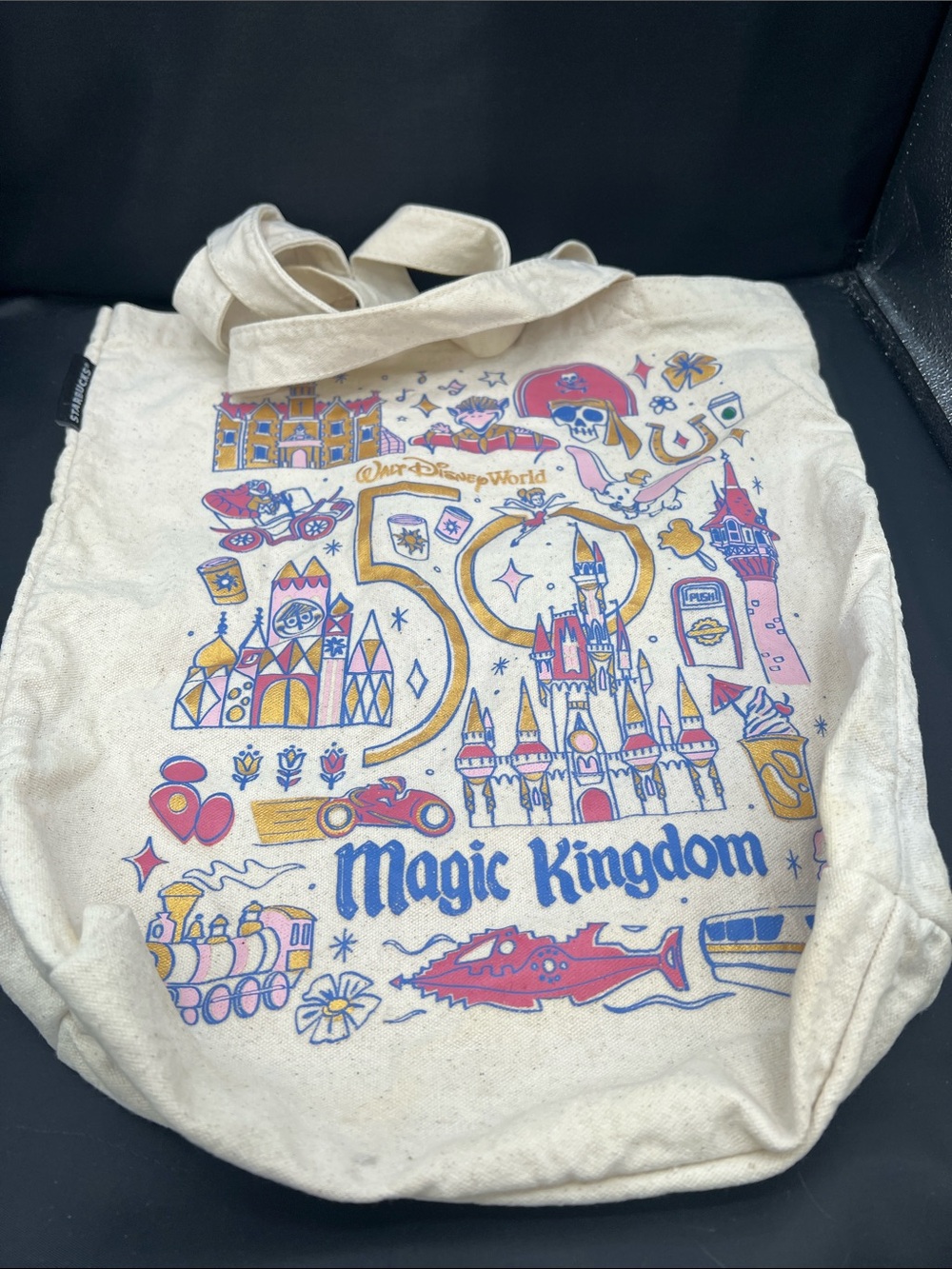 Starbucks Cream Magic Kingdom 50th Anniversary Tote with Pink and Blue Print